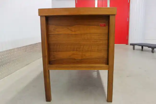 Right side of rosewood credenza showing solid wood grain and legs
