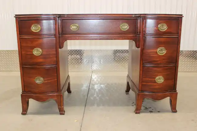 Alternate front view of mahogany kneehole desk