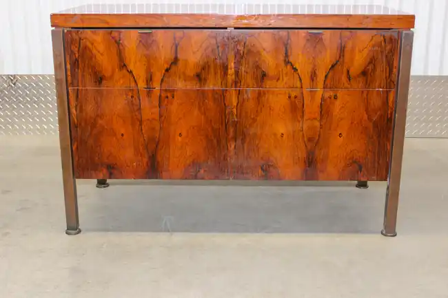 Front view of mid-century rosewood credenza with bookmatched doors