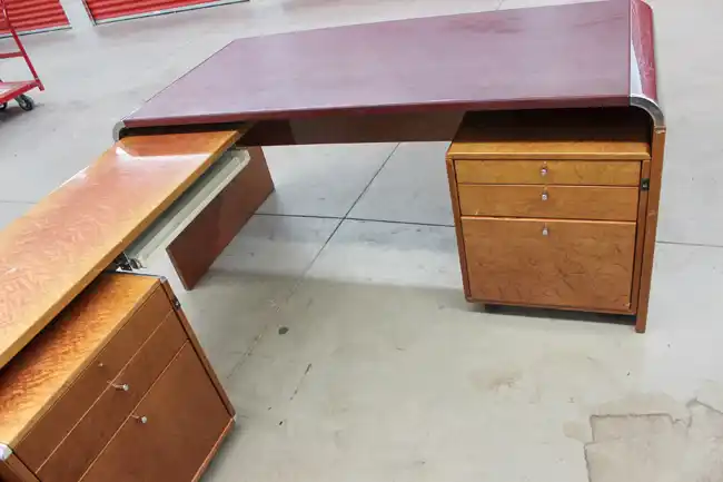 Front angle of minimalist maple L-shaped desk