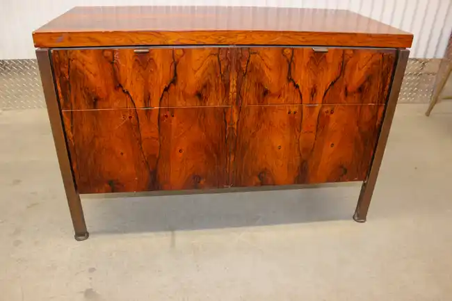 Close-up of bookmatched rosewood doors on credenza