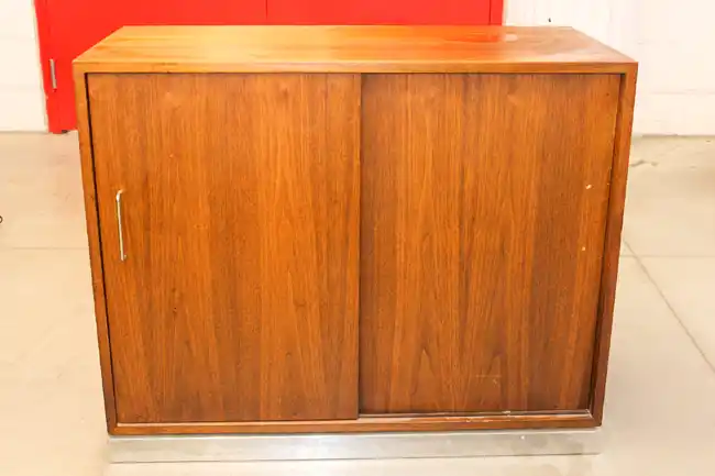 Front view of rosewood credenza with 2 doors