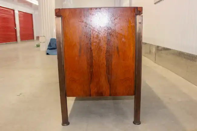 Left side view of mid-century rosewood credenza