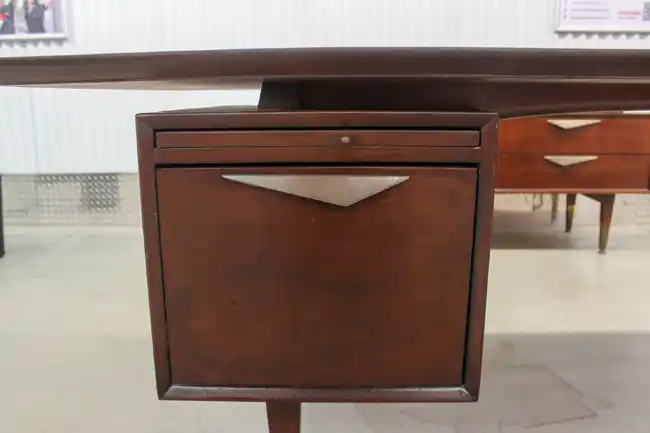 Detail of rosewood desk drawers and unique angular handles