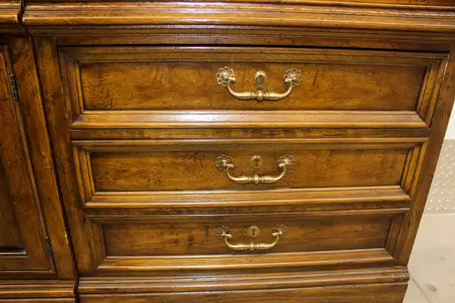 Detail of brass hardware on Sligh drawer front
