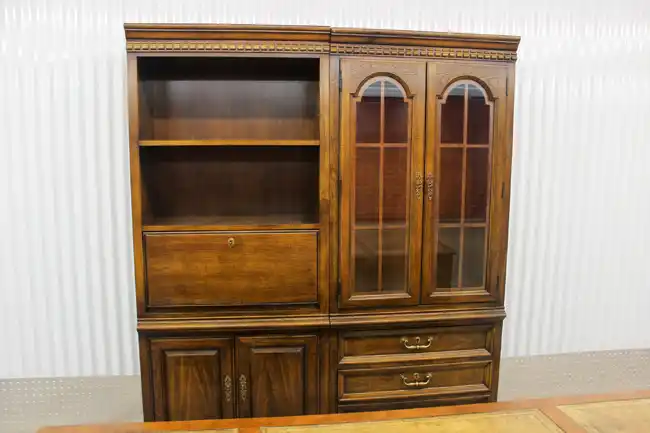 Front view of credenza with glass bookcase and shelving